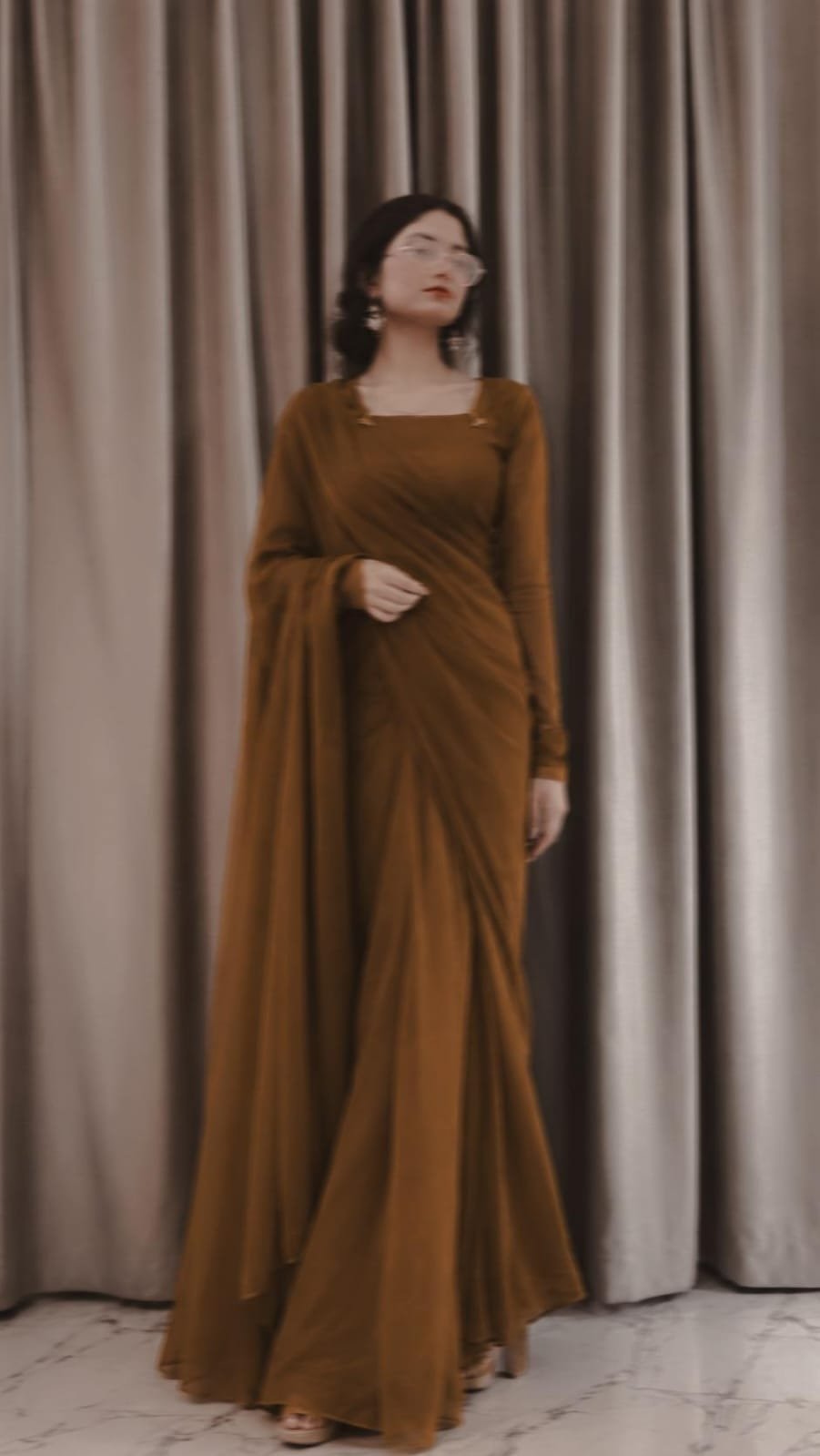 Laiba in her elegant brown outfit